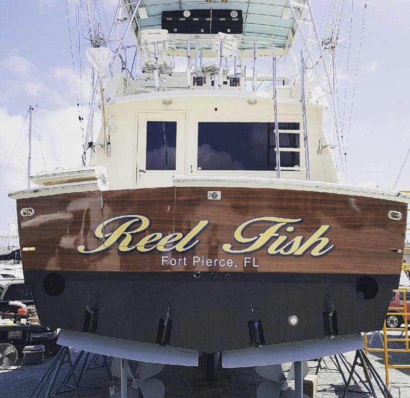 Luxury yacht wrap service in South Florida - custom graphic design