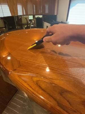 Ocean Wraps TikTok video: Body fence paint protection film (ppf) applied to teak. No mater the size of boat, protec
